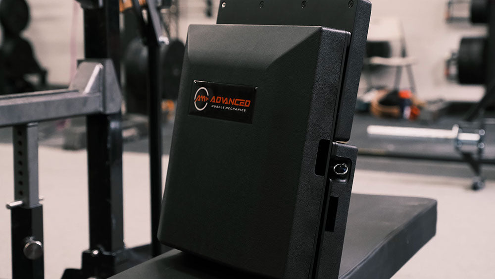 The Launch Pad is the industry's first specialty pad for the weight bench. It helps teach sound form, prevent injuries, and improve strength and power. This image presents the Launch Pad from an angled front view.